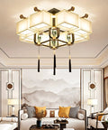 Chinese Motif Ceiling Pendant Light With Modern Fabric Shade And Classic Enamel Design Delivers Straight Up Cozy Ambiance Paired With Efficient Led Bulbs Perfect For Bedrooms Dining Nooks Or Trendy Cafes To Level Up Any Space Big Time, hanging above a stylish living room.