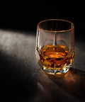 Eco Crystal Whiskey Gift Set With Handcrafted Granite Chill Stones And European Style 11.7 Oz Tumbler on dark surface
