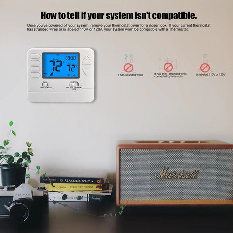 Mounted 5-1-1 Day Programmable Thermostat for Home Heating and Cooling with 1H/1C system next to a vintage speaker and books.