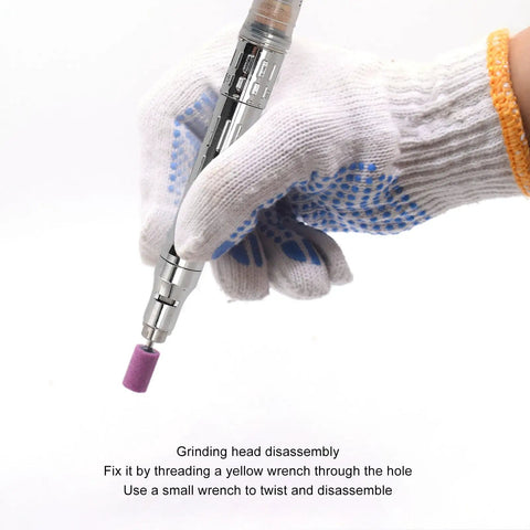 Top Shelf Pneumatic Air Pencil Die Grinder 70000 RPM Rotary Engraving Pen held in hand wearing a glove, focusing on grinding head disassembly.