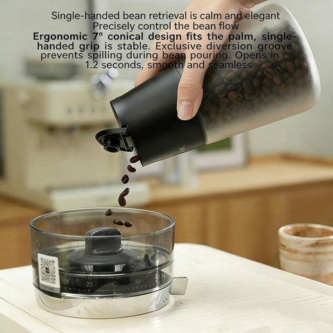 Smart Vacuum Coffee Bean Storage Canister With Digital Temp And Humidity Gauge 650Ml pouring coffee beans into a scale.