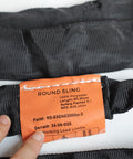 Label on heavy duty polyester round sling showing details, part number, and safety factor, part of Two Pack Black Endless Round Slings