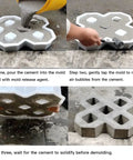 Reusable Plastic Grass Paver Molds With Five Hole Design For Concrete Pavers For Grass Driveways Walkways Parking And Landscaping Edging Made Of Durable ABS For DIY Friendly Reuse in use with cement pouring and demolding process.