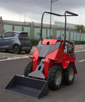 Red mini skid steer loader with wear resistant tires and foldable pedals backhoe attachment for construction jobs industrial sites