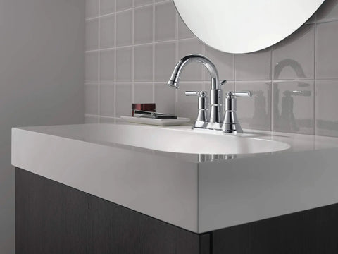 Westchester Centerset Chrome Bathroom Sink Faucet With Drain Assembly Included on a modern countertop in a tiled bathroom.