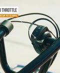 Close-up of variable-speed throttle on the handle of Electric GoKart For Kids 8 And Up With 12 MPH Top Speed Up To 40 Minutes Of Ride Time