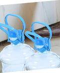 Gallon Water Bottle Handles 4 Pack Ergonomic Water Jug Lifters Carrier on 5 gallon bottles in home setting