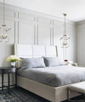 4 Light Lantern Pendant In Brushed Nickel E12 Base Chandelier For Dining Room Kitchen And Foyer hanging in a bedroom