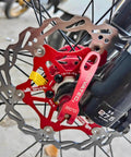 Floating Bike Brake Disc Rotor For MTB Road BMX 160mm with stainless steel outer and 7075 aluminum inner, mounted on bike.