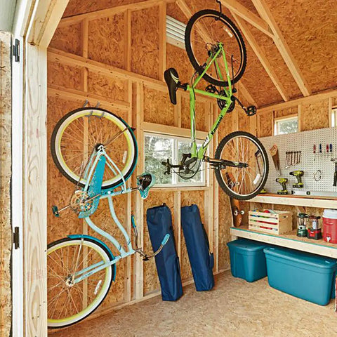 Two bikes stored using 8 Pack Bike Hanger Storage Hooks Heavy Duty Steel Screw In Hooks For Garage Wall And Ceiling Bicycle Storage Utility Tool Hanger Easy Install In Stud Walls Gray