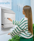 Woman using Locking Wall Mount Mailbox Built To Last, Weatherproof Steel With Secure Key Lock, No Fuss Easy Access Metal Flap