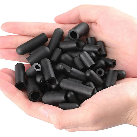 Hands holding Rubber Vacuum Cap Set 120 Piece Assortment in 10 Sizes For Tubes From One Eighth Inch To One Half Inch OD.