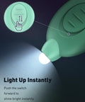 Close-up of green 5 Pack LED Keychain Flashlights, 12 Lumen Mini Pocket Lights for outdoor work showing switch mechanism.