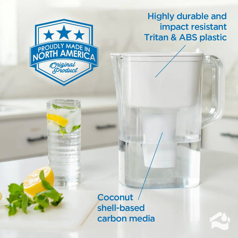 10-Cup BPA-Free Water Pitcher With Fast-Flow Carbon Filter, 2.4L Capacity, on kitchen counter with glass of lemon water