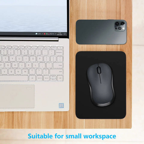 Small Mouse Pad 8 By 6 Inch Thick Rubber With Premium Textured Non Slip Surface next to laptop and smartphone on desk