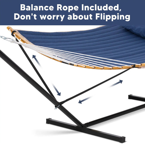 Portable Outdoor Hammock With Stand And Carrying Bag Heavy Duty Camping Hammock With Soft Pillow Stable Balance Ropes Durable Two Layer Quilted Polyester Non Fading Comfort Dark Blue For Chill Sessions Outdoors with black metal stand and blue quilted fabric, side view showing stable ropes.