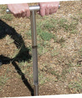 Stainless Steel Soil Sample Probe Tool With T Handle For Easy Field Soil Sampling in action on a grassy field