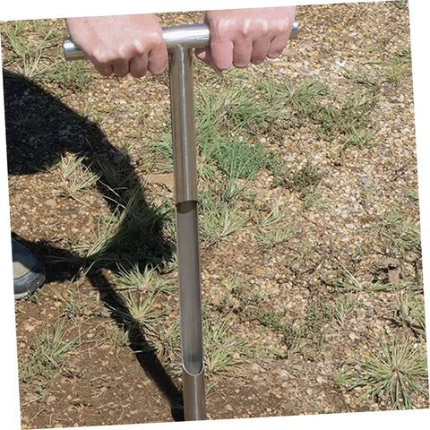 Stainless Steel Soil Sample Probe Tool With T Handle For Easy Field Soil Sampling in action on a grassy field