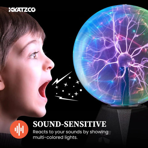 Child interacting with an Eight Inch Interactive Plasma Ball Nebula Glow Globe With Touch And Sound Reactive Modes Plug In With A Six Foot Cord Totally Lit For Parties And Home Decor, STEM Projects, Classroom Demos And Science Fun, demonstrating sound-sensitive mode with colorful lightning.