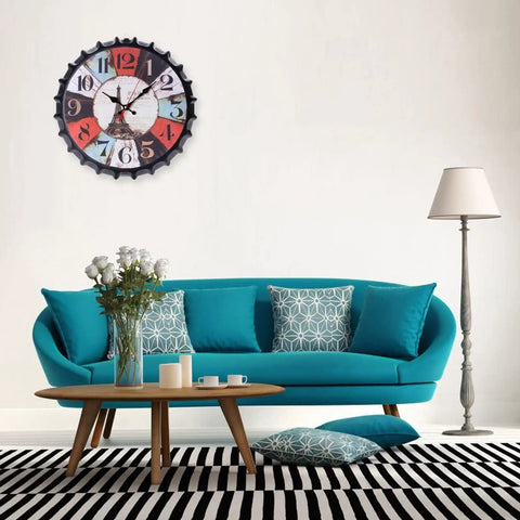 Living room with teal couch, black and white rug, colorful wall clock, suitable for Quartz Clock Movement Kit Replacement Battery Operated Silent Mechanism For DIY Wall Clocks No Brainer Install 13.5mm Shaft 5.5mm Thread Fits 1-3mm Clock Panels Repair Parts For Timely Fixes.