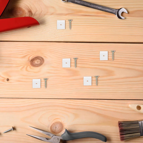 50 Piece Metal And Plastic 45 Degree Triangle Shelf Brackets for kitchen cabinets on wooden surface with tools