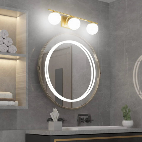 Slick Gold Vanity Light Fixture Three Light Mid Century Modern Bathroom Wall Sconce With Milky Glass Globe, 24 Inch Long, mounted above mirror