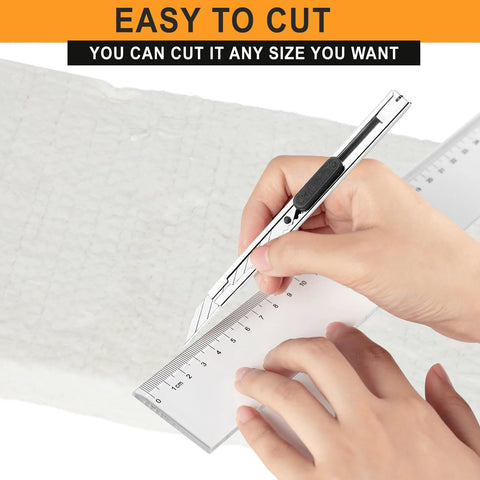Amazon Kaowool ceramic fiber insulation blanket, 2 in thick by 15 in x 24 in, being cut with a utility knife
