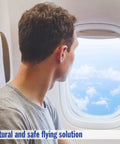 Passenger looks out plane window promoting Airplane Pressure Relief Earplugs With 26dB NRR And 33dB SNR For Flying Pain Free Ears