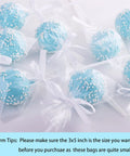 Clear 3x5 Inch Cake Pop Bags With Twist Ties holding blue cake pops, 100 Pack, Food Safe Cellophane Bags For DIY Party Favors And Gift Wrapping