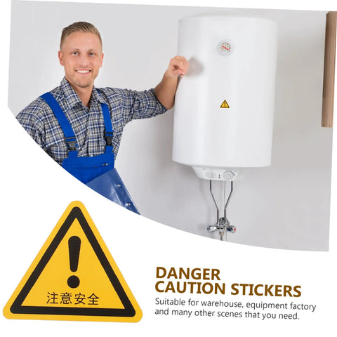 Engineer with equipment displaying 24 Pcs Machine Warning Labels Safety Sign Stickers Caution Decals for Equipment Factory Indoor Outdoor Use Heads Up Safety Kit for Workshop Home Office and Industrial Spaces.