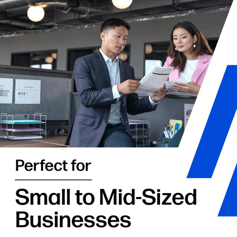 Office setting with two professionals reviewing documents, suitable for small to mid-sized businesses.