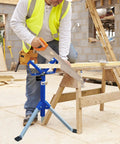Worker using V Shaped Triangle Roller Stand For Woodworking With 176 Lbs Load Capacity next to sawhorse on construction site