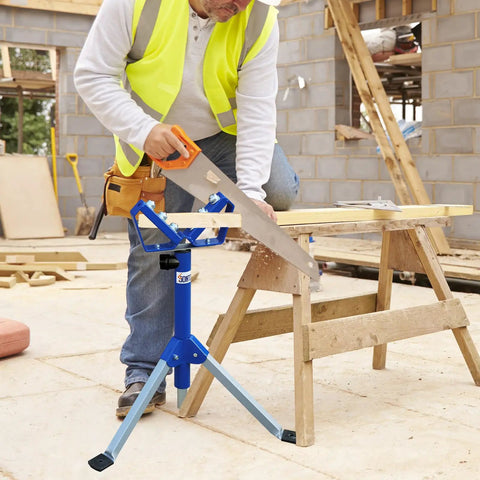 Worker using V Shaped Triangle Roller Stand For Woodworking With 176 Lbs Load Capacity next to sawhorse on construction site