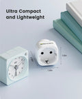 Europe to US Plug Adapter for Travel No Fuss EU to US Converter next to a clock and books, showing compact size and dimensions