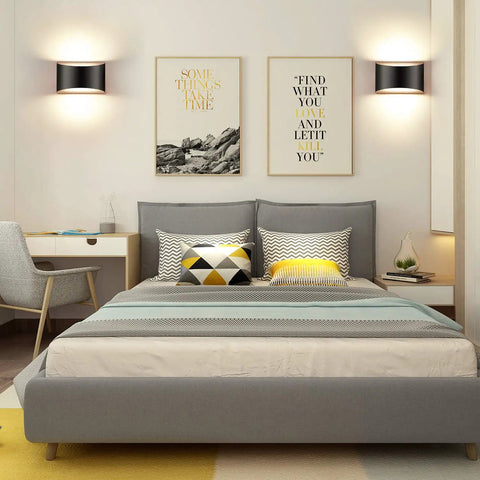 Bedroom with dimmable black LED wall sconces set of 2 with up down lighting, above gray bed, modern lamps, 12W warm white.