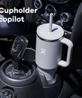 On The Fly 40 Oz Stainless Steel Travel Tumbler With Comfort Grip Handle And Leak Proof Straw Lid in car cupholder.