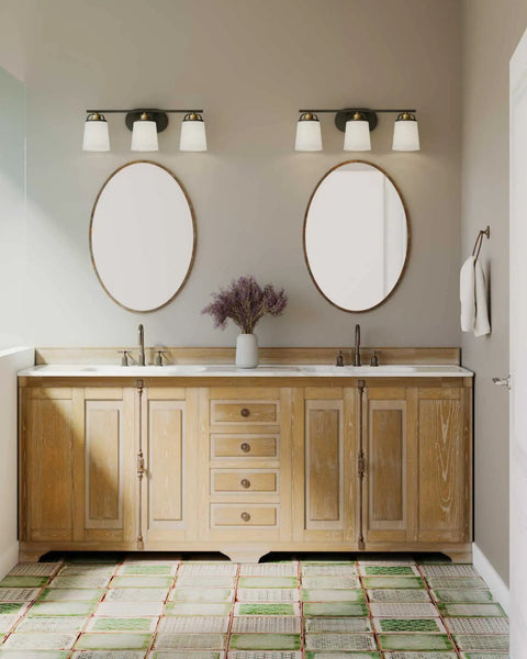 West Village Bath And Vanity Light Fixture In Antique Bronze, Modern Industrial Style, above dual vanity in a bathroom