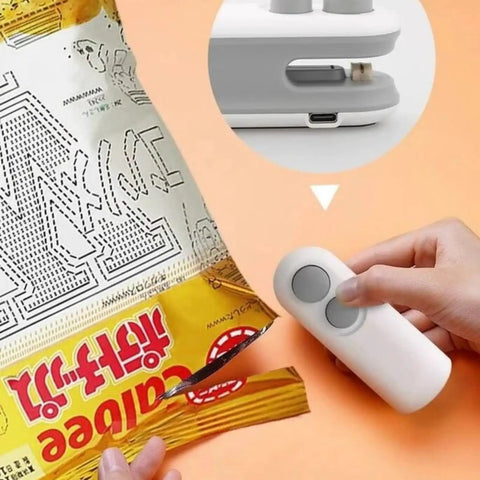 Using 2 In 1 Portable Bag Sealer And Cutter With Rechargeable Battery Handy Handheld Heat Sealer for sealing a chips bag securely.
