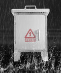 Weatherproof Stainless Steel Electrical Junction Box With Lock And Mounting Plate For Outdoor Use, Heavy Duty Enclosure To Protect Electrical Equipment From Rain, Dust, Snow And UV Rays. Front view in heavy rain