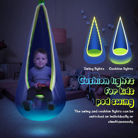 Child sitting in Light Up Kids Pod Swing Chair with LED Lights, illuminated blue and green, room background with toys.