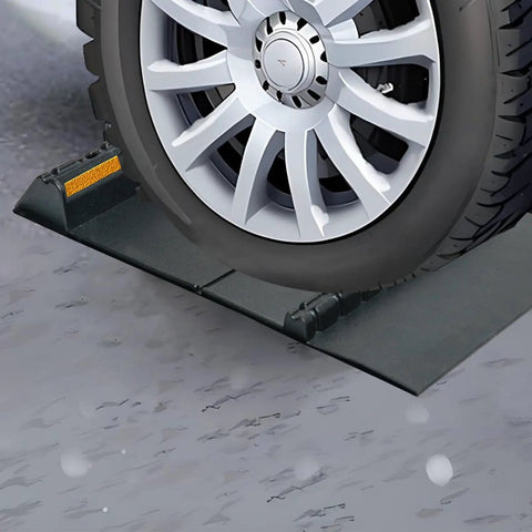 Self Adhesive Anti Skid Rubber Car Parking Guide Mat in use with reflective strip, guiding a car tire for precise parking.