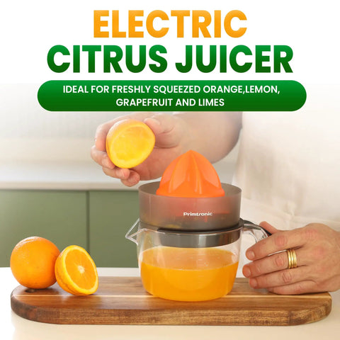 Primtronic Electric Citrus Juicer With Large 24 Oz Capacity And Seed Filter Auto Reverse Function Compact Design For Oranges Lemons Limes BPA Free Black Orange, fresh juice being squeezed.