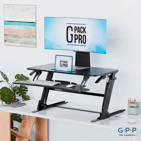 36 Inch Wide Standing Desk Converter For Dual Monitors Sit To Stand Workstation Height Adjustable Up To 17.3 Inches With Large Keyboard Tray Black Easy Install Ergonomic Durable Pro Grade on office desk