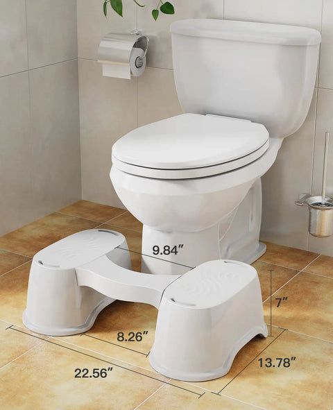 7 Inch Toilet Stool For Easier Posture And Faster Poops in bathroom with detachable footrests and ergonomic design.