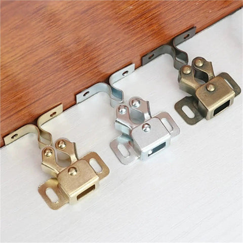 Antique Copper Twin Roller Cabinet Door Catches With Striker And Mounting Screws, 1 Pack, displayed on a wooden surface, various colors