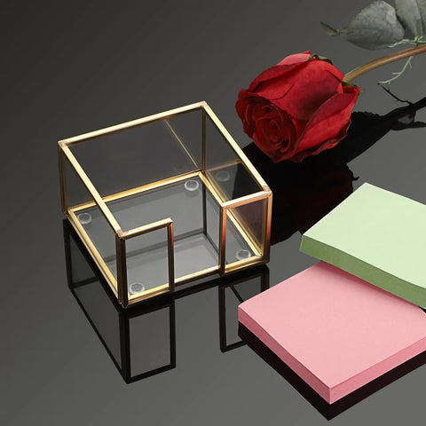 Gold Trimmed Glass Sticky Note Holder With Non Slip Pads For 3x3 Inch Notes, elegant post it dispenser on black surface, with rose and pads.