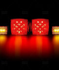 LED Trailer Light Kit 12V Submersible Tail Marker Lights With Wiring Harness For Boat Car Truck RV Utility Snowmobile Stop Turn Reverse DOT Certified Road Ready, illuminated red and amber lights on black background