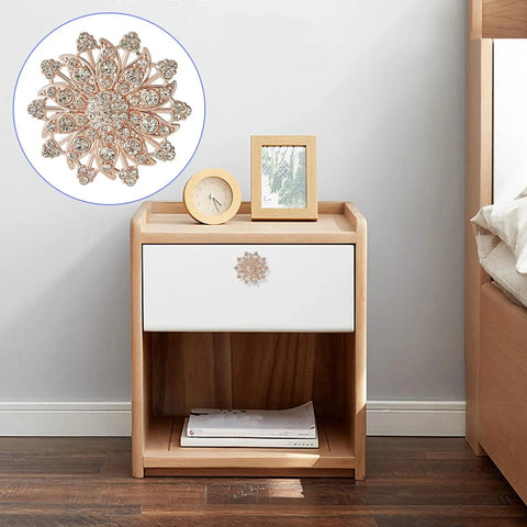 Four Piece Flower Shape Cabinet Knob Set In Rose Gold With Crystal Glass Pull Handles For Cabinets, Drawers, Dressers, Wardrobes, Closets And Other Furniture With Screws That Look Ultra Cool, installed on a wooden nightstand drawer
