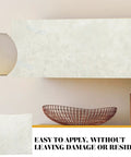 Peel And Stick Marble Wallpaper Roll Covers Countertops And Fridges With A Slick Removable Oil Proof Finish Straight Up Easy Self Adhesive Marbling Decal That Adheres Tight Without Residue For A Solid Home Upgrade on a wall with a minimalist decor.
