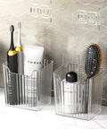 Four Pack Clear Wall Mount Organizers With Super Strong Adhesive Perfect For Kitchen Cabinets And Pantries Food Grade Storage Bins Stackable Desktop Baskets holding toiletries and brushes.